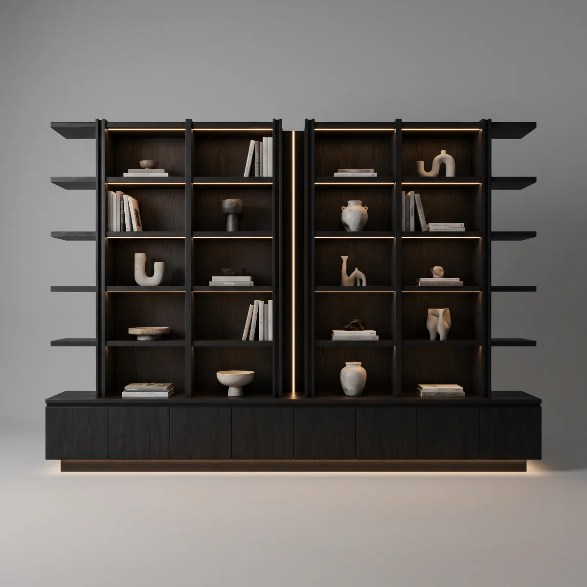 Black oak shelving towers lit under every shelf, on a long black base with eight doors