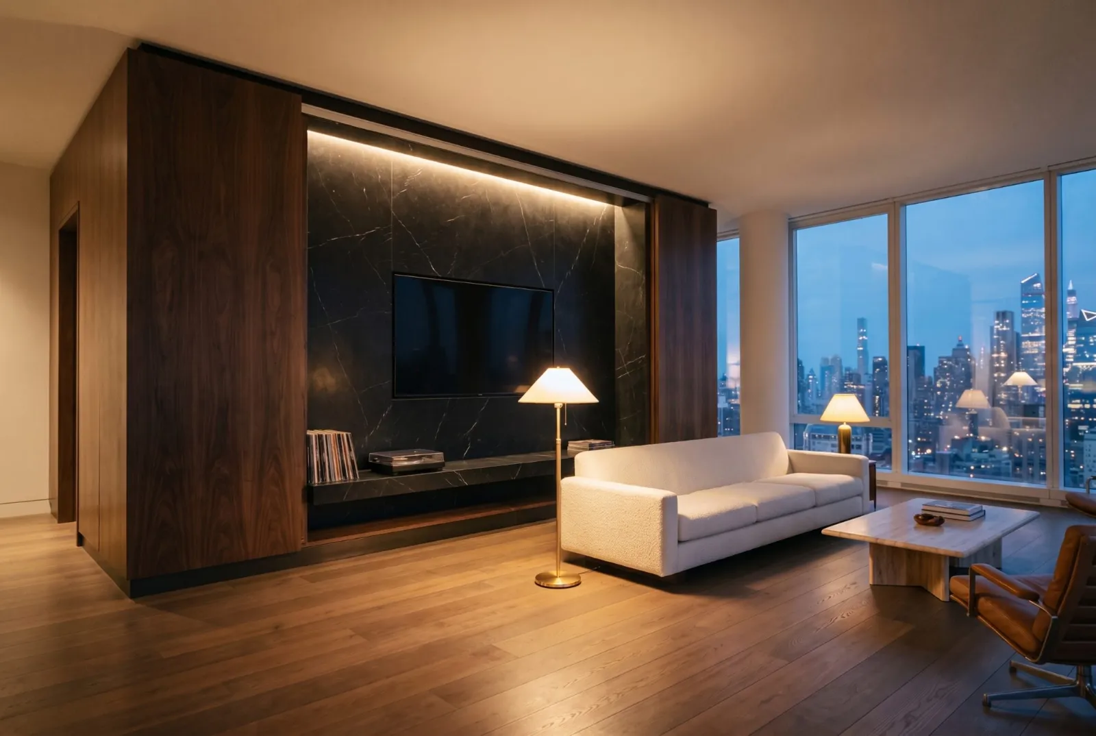 Walnut panels open onto a black stone media wall lit from above